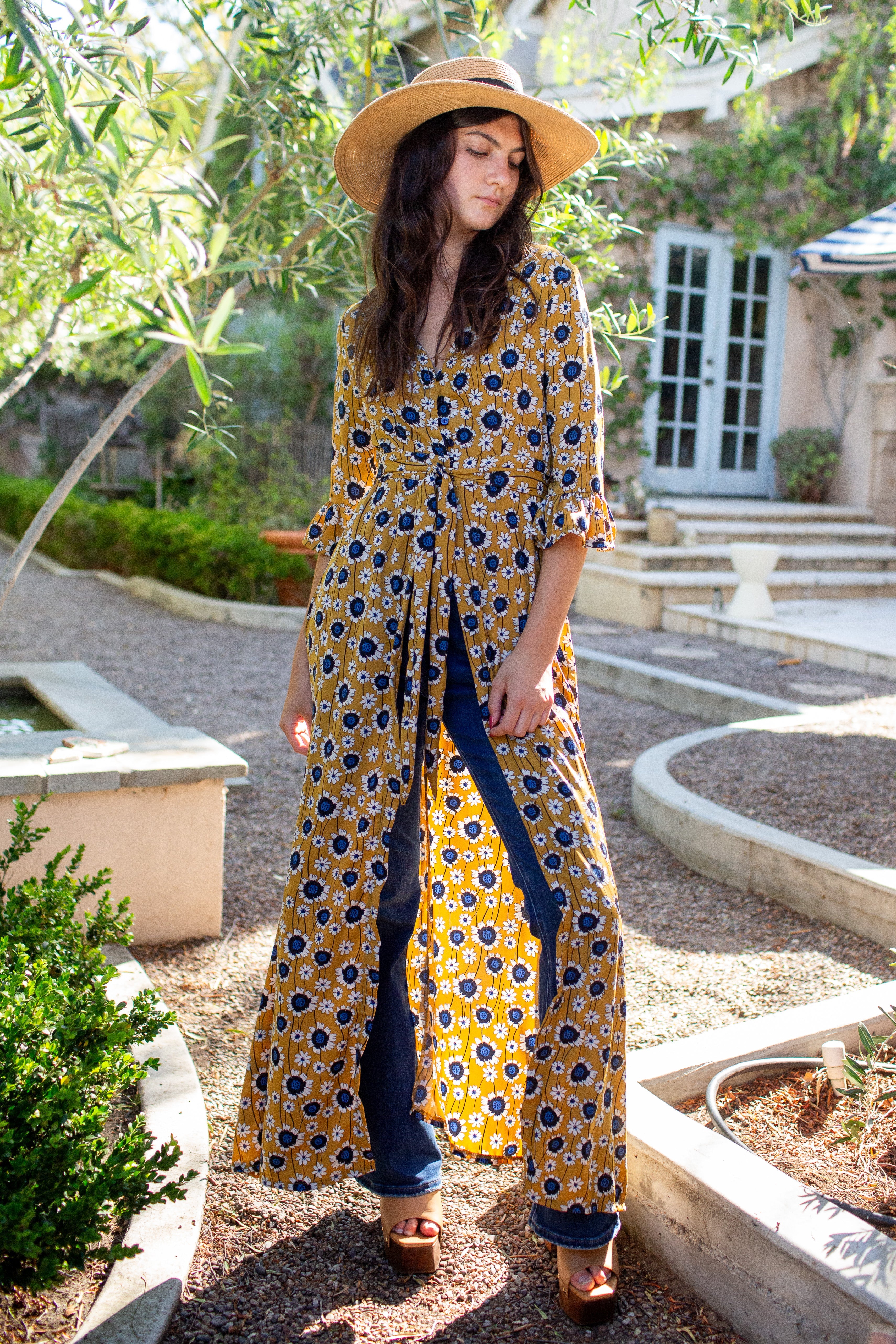 Golden sunflower-patterned dressing gown by Jennafer Grace, soft fabric, with floral design and relaxed fit.