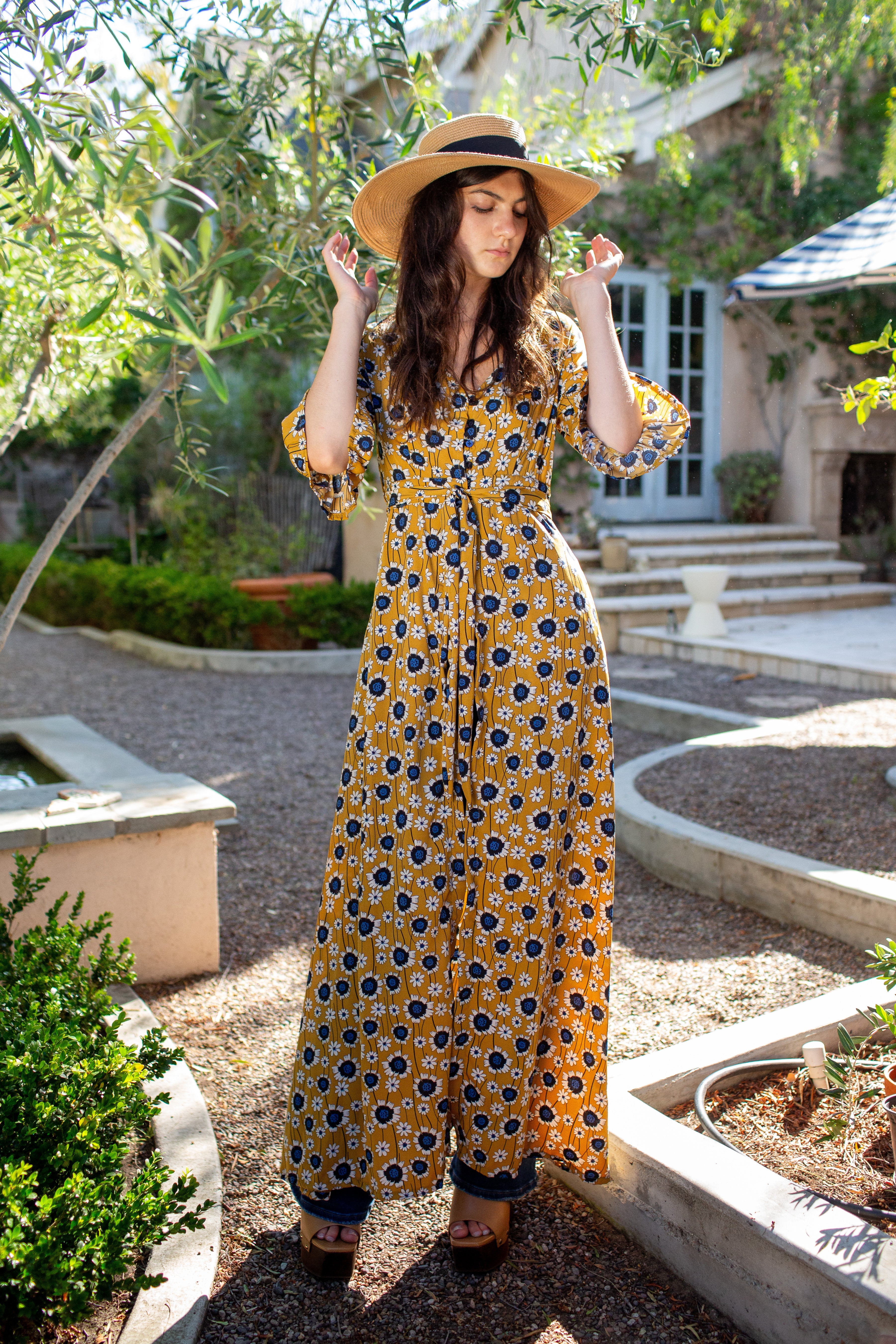 Gold sunflower print dressing gown by Jennafer Grace, featuring a soft fabric and relaxed fit for comfortable loungewear.