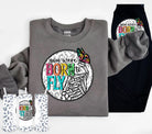 Gray graphic tee from Anchored Grace Boutique featuring "You Were Born to Fly" inspirational text and a bird illustration.