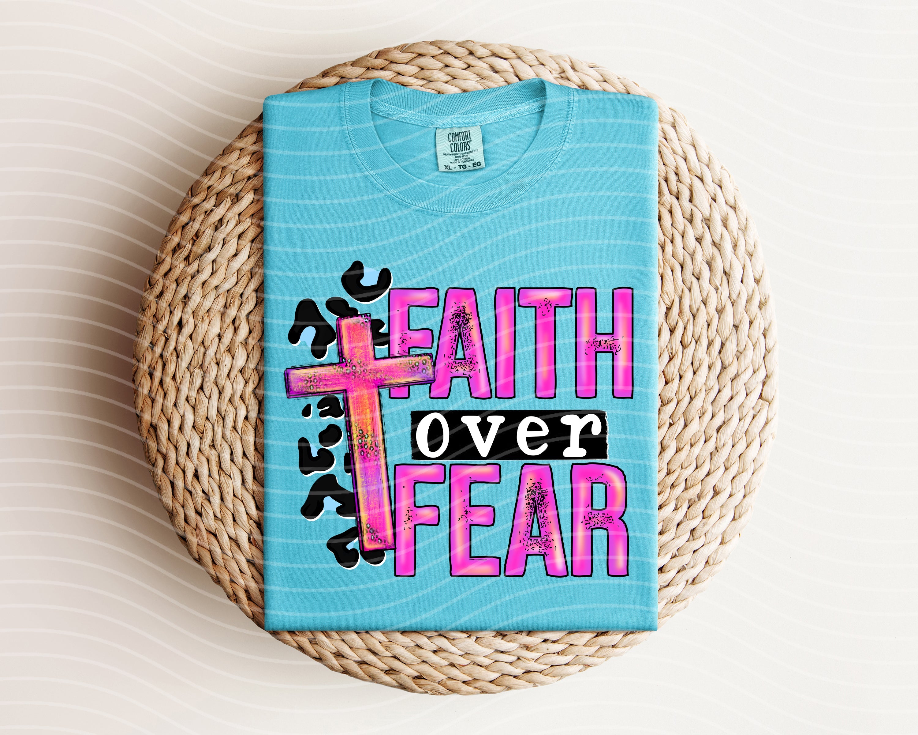 Faith Over Fear graphic tee by Anchored Grace Boutique, featuring bold lettering on a comfortable casual t-shirt.