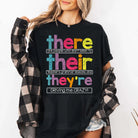 Black graphic tee from Anchored Grace Boutique featuring bold white text that says "There are People Who Don't Listen."