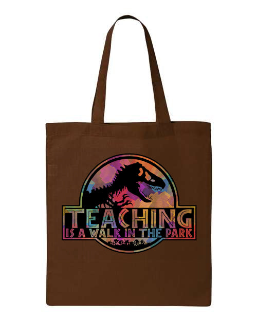 Anchored Grace Boutique tote bag with "Teaching is a Walk in the Park" printed design, made of durable fabric for everyday use.