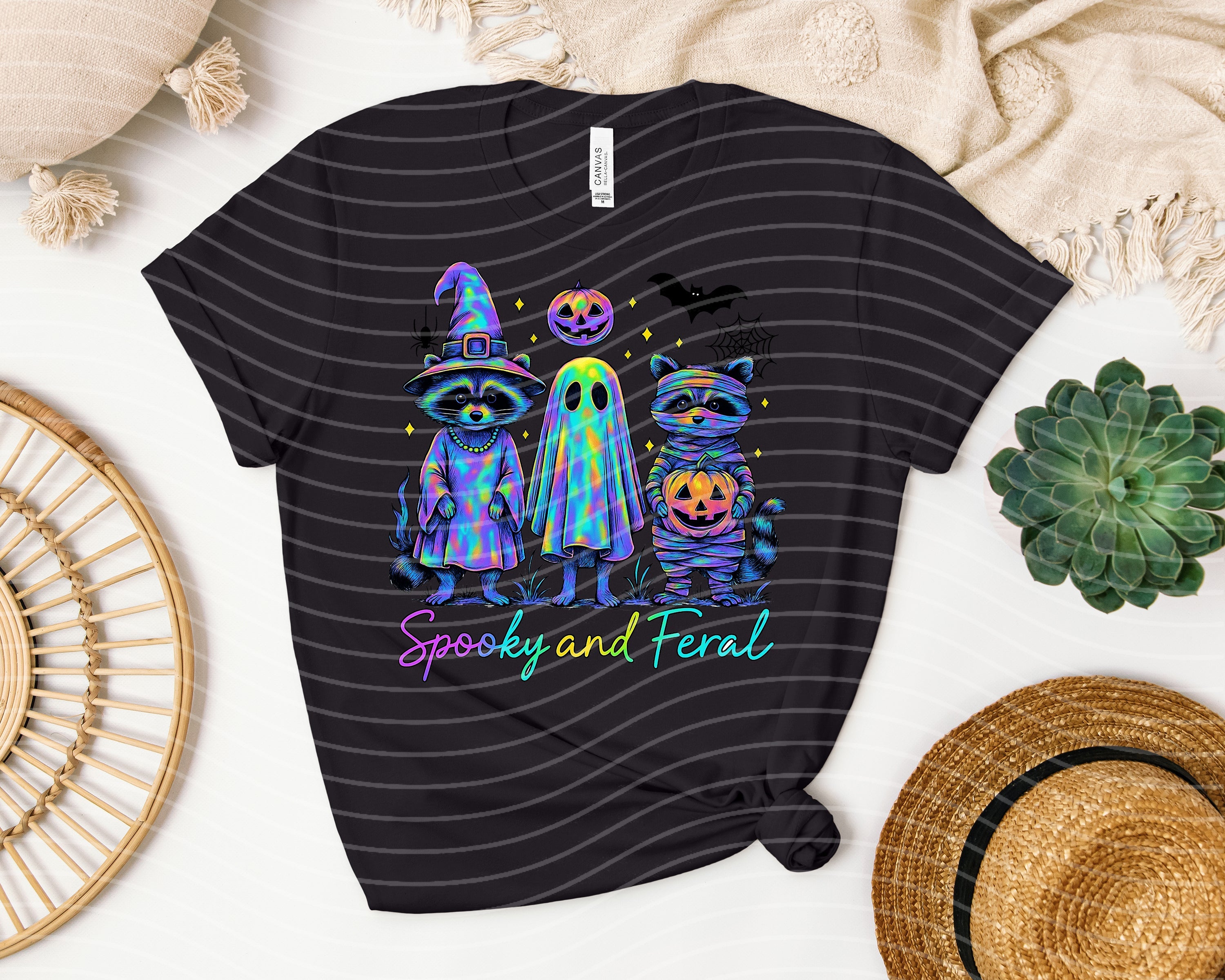 Spooky and feral graphic tee by Anchored Grace Boutique featuring dark, edgy artwork on a casual t-shirt for women.