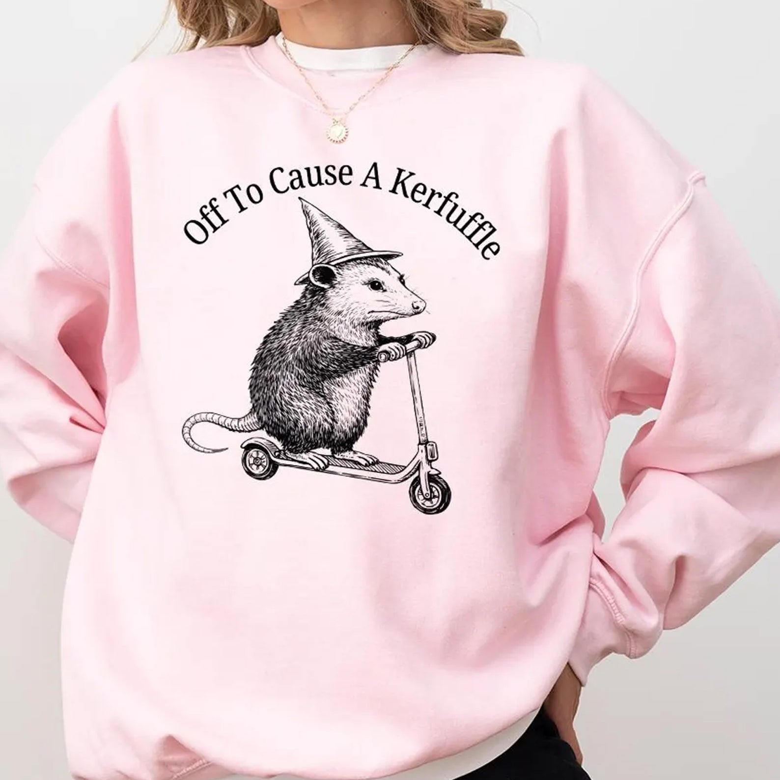 Off to Cause a Kerfuffle graphic tee from Anchored Grace Boutique, featuring a colorful, casual design on a soft cotton T-shirt.