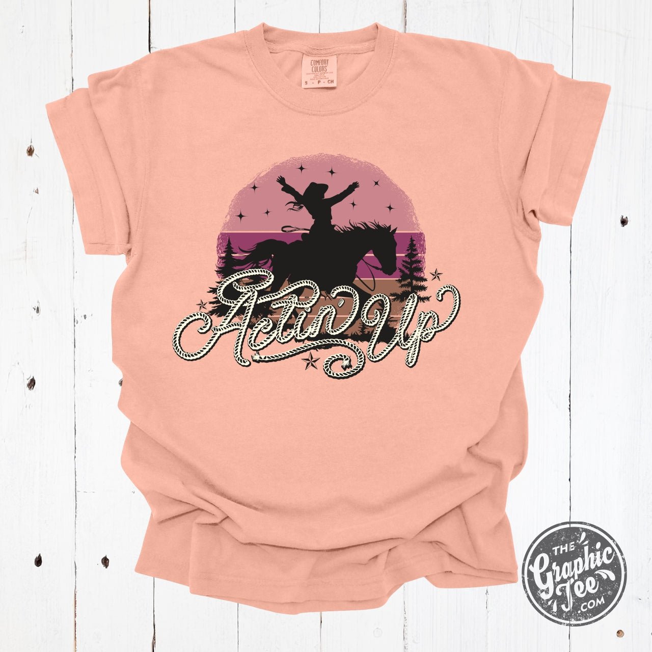 Actin' Up Pigment Dyed SS Graphic Tee by The Graphic Tee, with a relaxed fit and vintage-style graphic design.