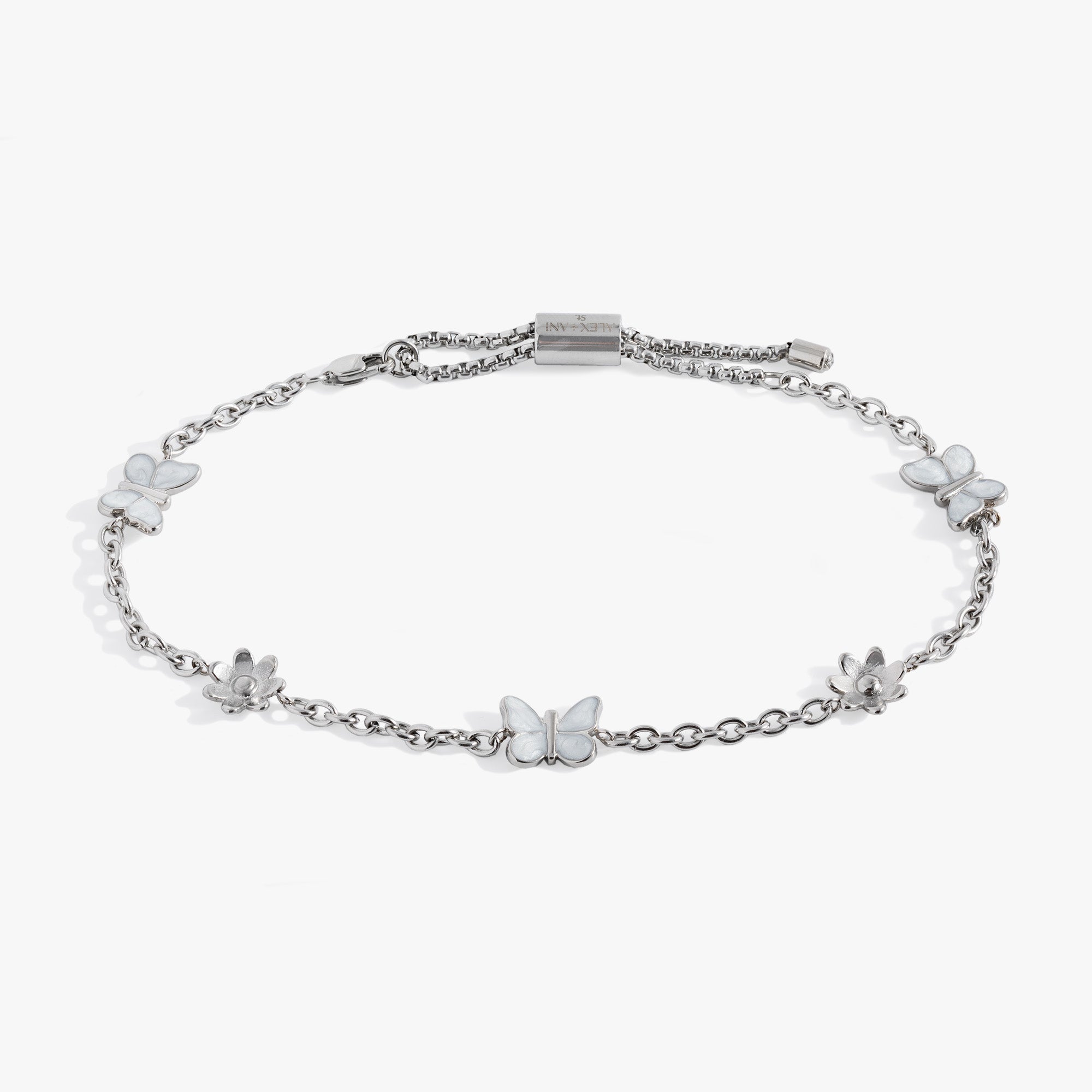Gold stainless steel anklet featuring butterfly and flower charms by ALEX AND ANI, worn on the ankle with delicate chain links.