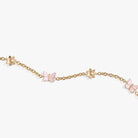 Gold stainless steel butterfly and flower anklet by ALEX AND ANI featuring delicate charms on a sleek chain.