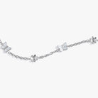 Gold stainless steel butterfly and flower anklet by ALEX AND ANI featuring delicate charms and adjustable chain.