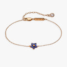 ALEX AND ANI crystal Forget-Me-Not flower bracelet with 14kt gold-over-sterling silver design and delicate floral accents.