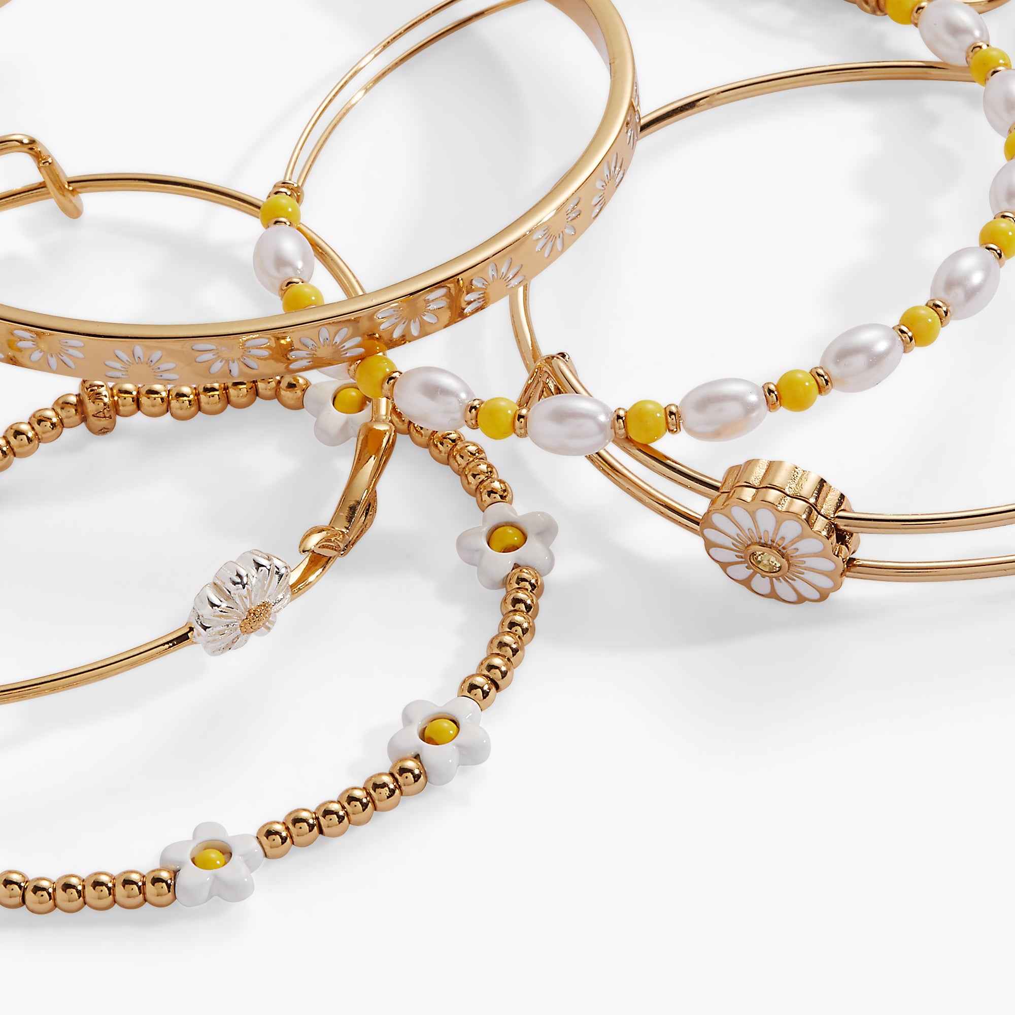 Set of five gold Daisy Flower beaded bangles from ALEX AND ANI, stylish bracelet collection with floral accents.