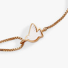 Gold Alex and Ani Dove 'Peace' mother of pearl pull chain bracelet with elegant design and subtle shimmer.