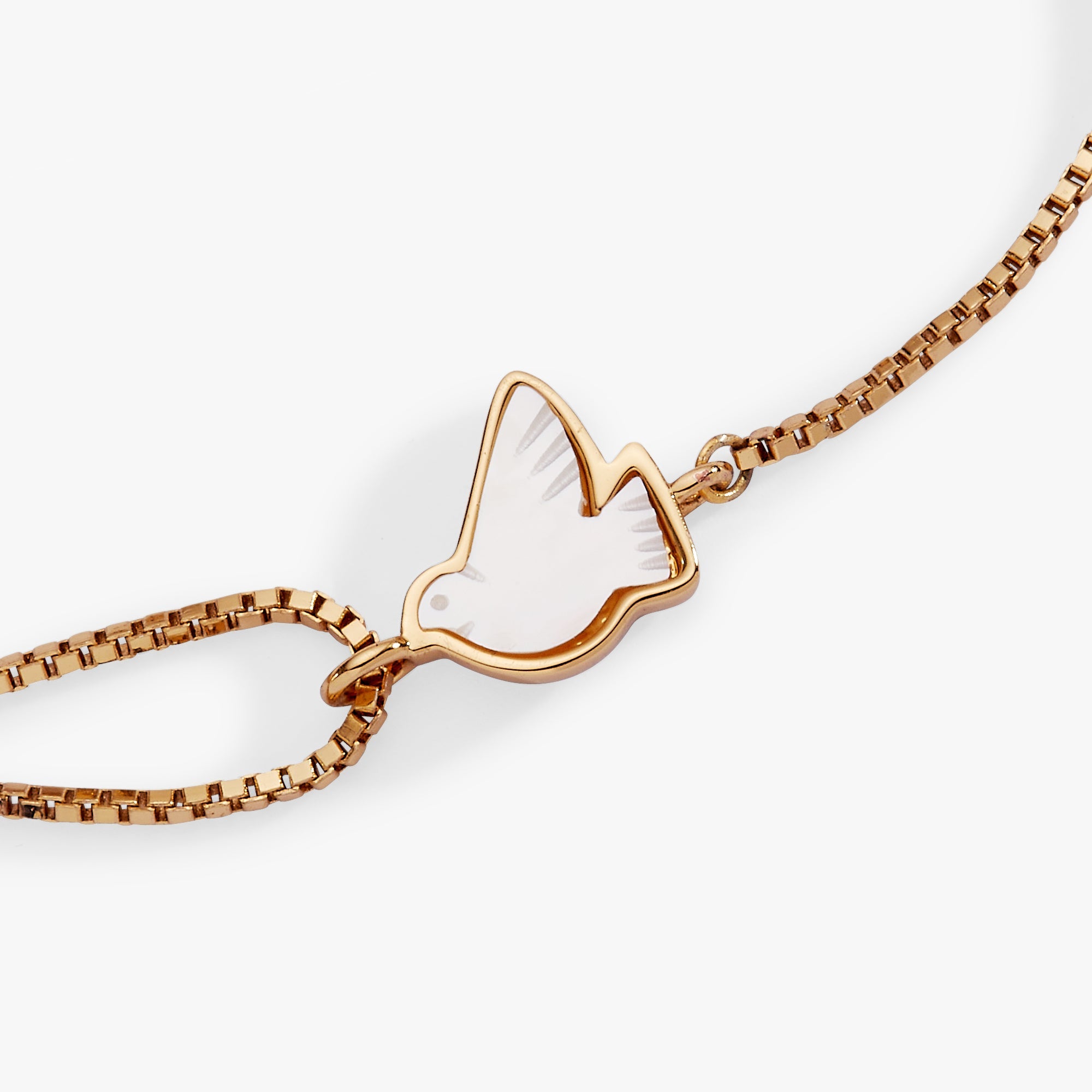 Gold Alex and Ani Dove 'Peace' mother of pearl pull chain bracelet with elegant design and subtle shimmer.