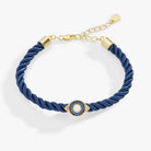 Gold Evil Eye adjustable cord bracelet by ALEX AND ANI featuring a protective eye charm and adjustable fit.
