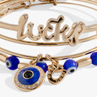Set of three gold Evil Eye bangles by ALEX AND ANI, featuring protective eye charms and sleek bracelet design.