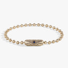 Gold Evil Eye Barrel Closure Bracelet by ALEX AND ANI featuring a protective evil eye charm and sleek barrel clasp.