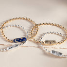 Gold Evil Eye Barrel Closure Bracelet by ALEX AND ANI featuring a protective evil eye charm and sleek barrel clasp.