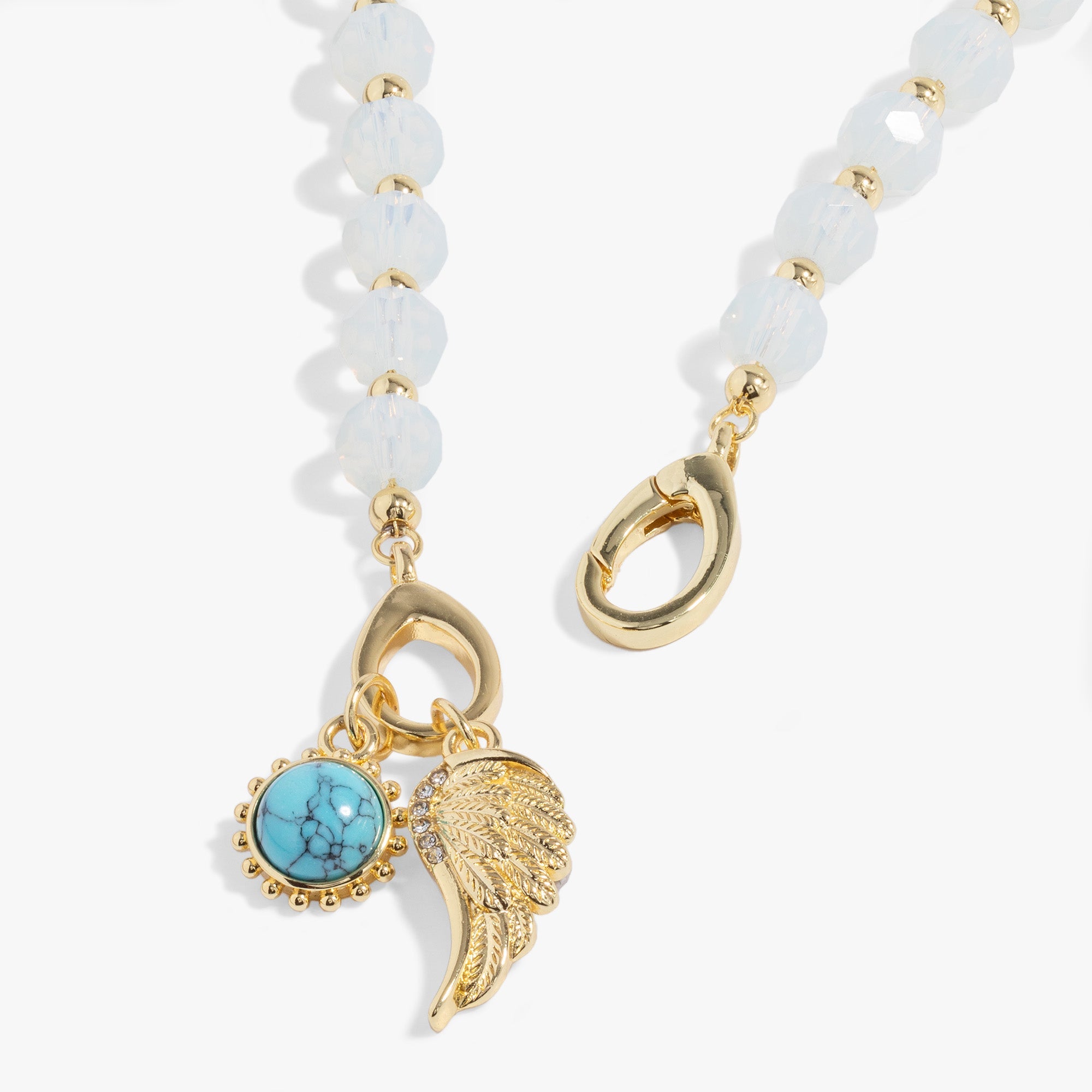 Gold Guardian Angel Wrap Bracelet by ALEX AND ANI featuring a delicate angel charm and adjustable wrap design.