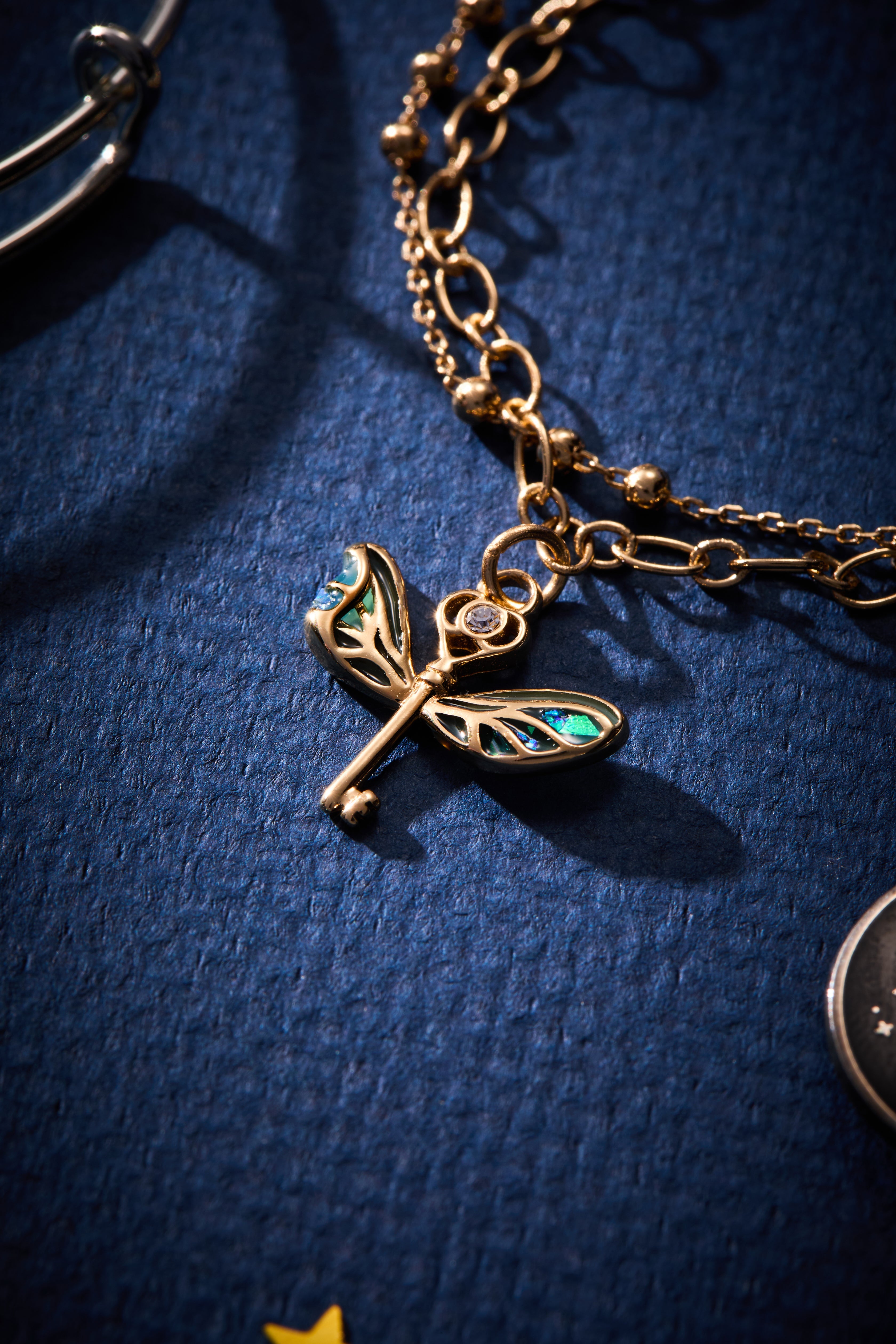 Gold Harry Potter™ Flying Keys adjustable bracelet by ALEX AND ANI featuring detailed key charms on a sleek bracelet.
