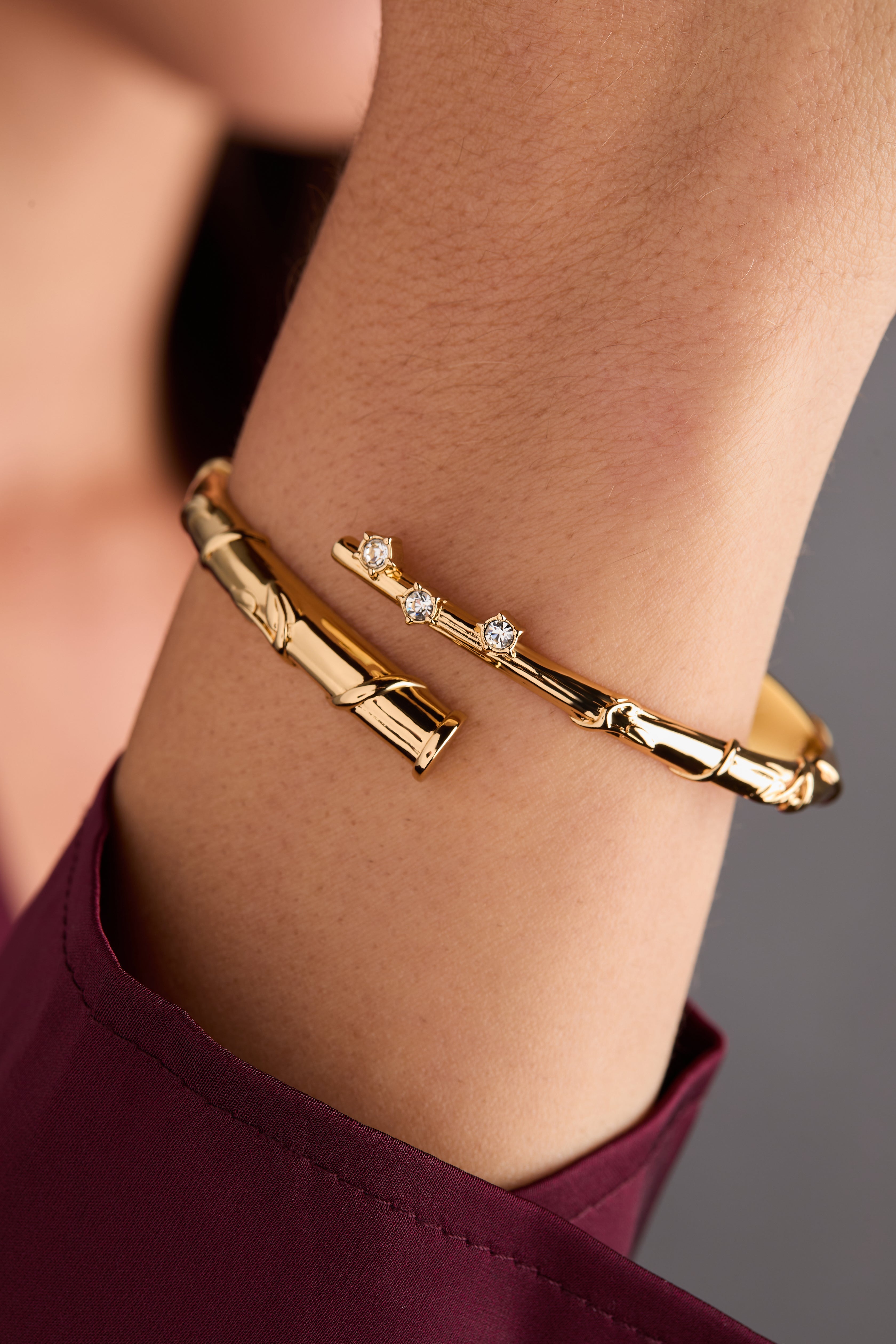 Gold Harry Potter Hermione Wand Bypass Cuff bracelet by ALEX AND ANI featuring a wand-shaped open cuff design.