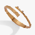 Gold Harry Potter Hermione Wand Bypass Cuff bracelet by ALEX AND ANI with detailed wand and magical design.
