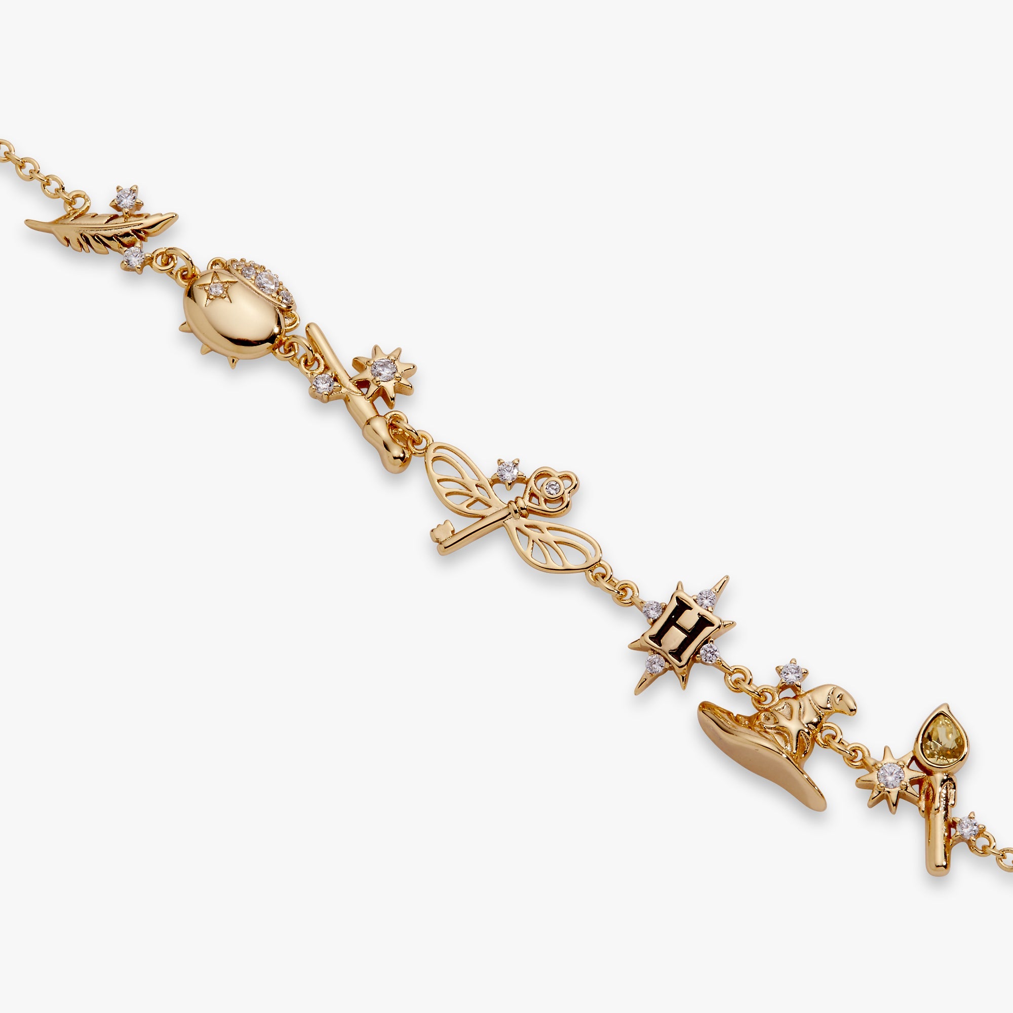 Gold Harry Potter™ Mixed Icon Inline Charm Bracelet by ALEX AND ANI, featuring magical-themed charms on a sleek bracelet.