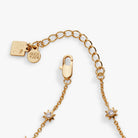 Gold Harry Potter™ Mixed Icon Inline Charm Bracelet by ALEX AND ANI featuring magical symbols and charms on a stylish bracelet.