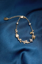 Gold Harry Potter™ Mixed Icon Inline Charm Bracelet by ALEX AND ANI featuring magical themed charms and intricate design.
