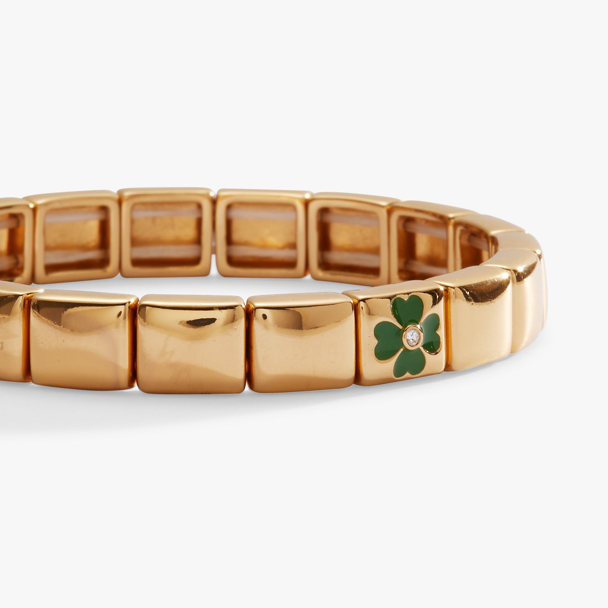 Gold ALEX AND ANI Lucky Four-Leaf Clover Stretch Bracelet with charm and elastic band for a stylish, lucky accessory.