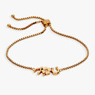 Gold Lucky Symbol Bolo Bracelet by ALEX AND ANI featuring a sleek adjustable design and a prominent lucky charm.