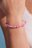 Gold PEEPS® Bunny beaded bangle bracelet by ALEX AND ANI featuring colorful beaded design and playful bunny charm.