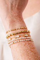 Gold PEEPS® Bunny Bolo Bracelet by ALEX AND ANI featuring a playful bunny charm and adjustable cord design.