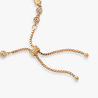 Gold PEEPS® Bunny Bolo Bracelet by ALEX AND ANI featuring a bunny charm and adjustable cord for a playful, stylish look.