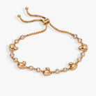 Gold PEEPS® Chick Bolo bracelet by ALEX AND ANI featuring a charming chick charm on a sleek bolo bracelet.