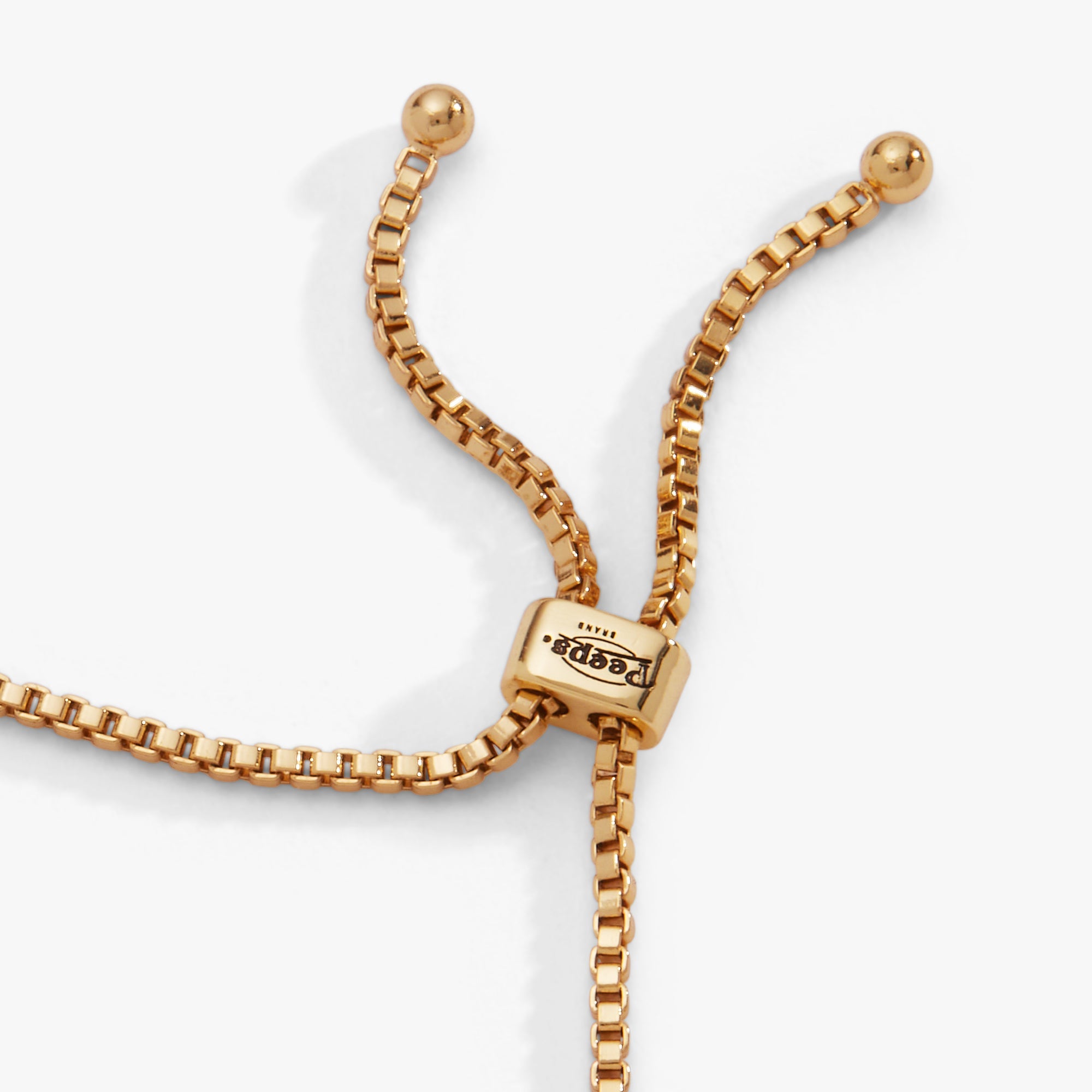 Gold PEEPS® Chick Bolo Bracelet by ALEX AND ANI featuring a playful chick charm and adjustable cord for a stylish accessory.