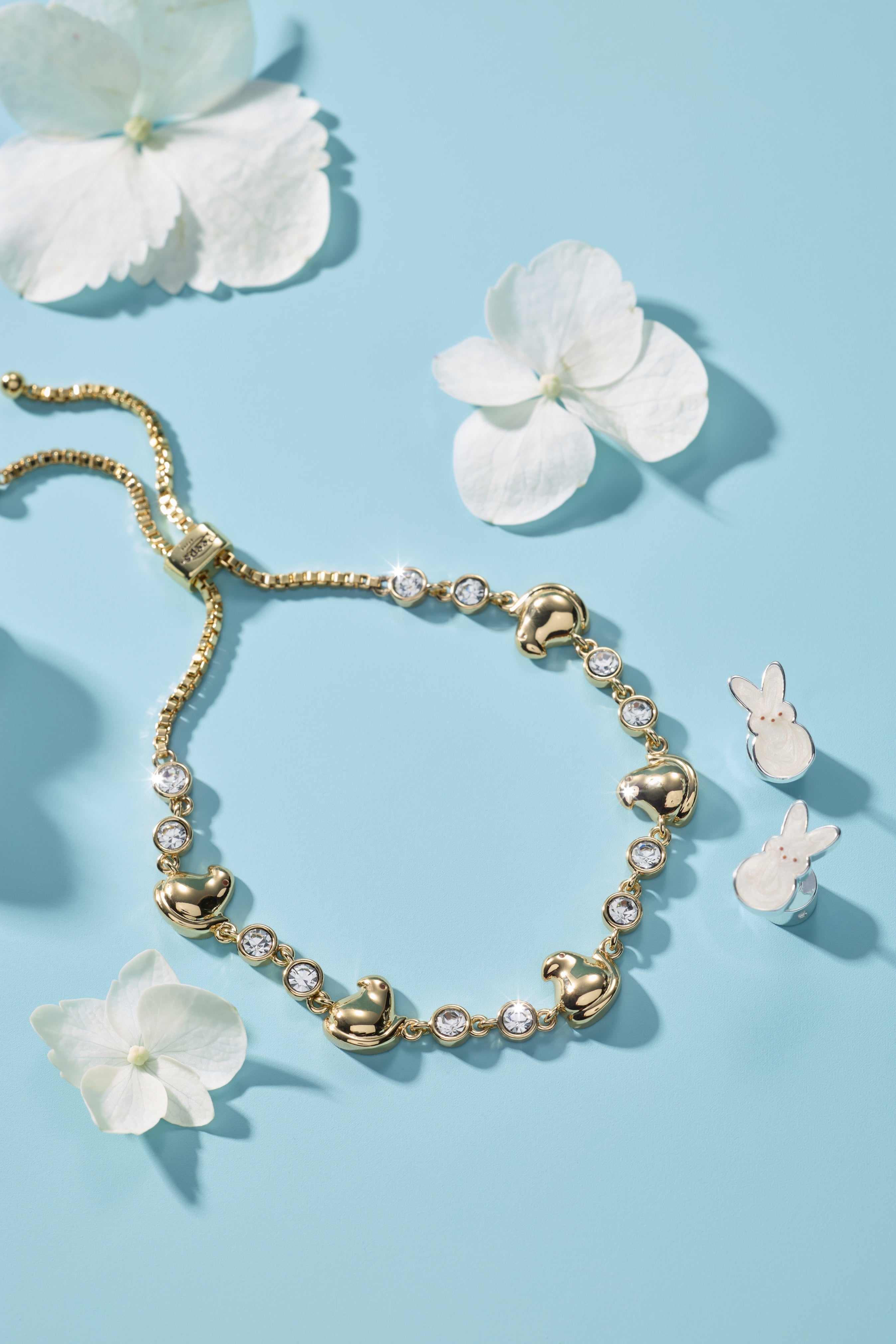 Gold PEEPS® Chick Bolo Bracelet by ALEX AND ANI featuring a charming chick charm and adjustable bolo design.