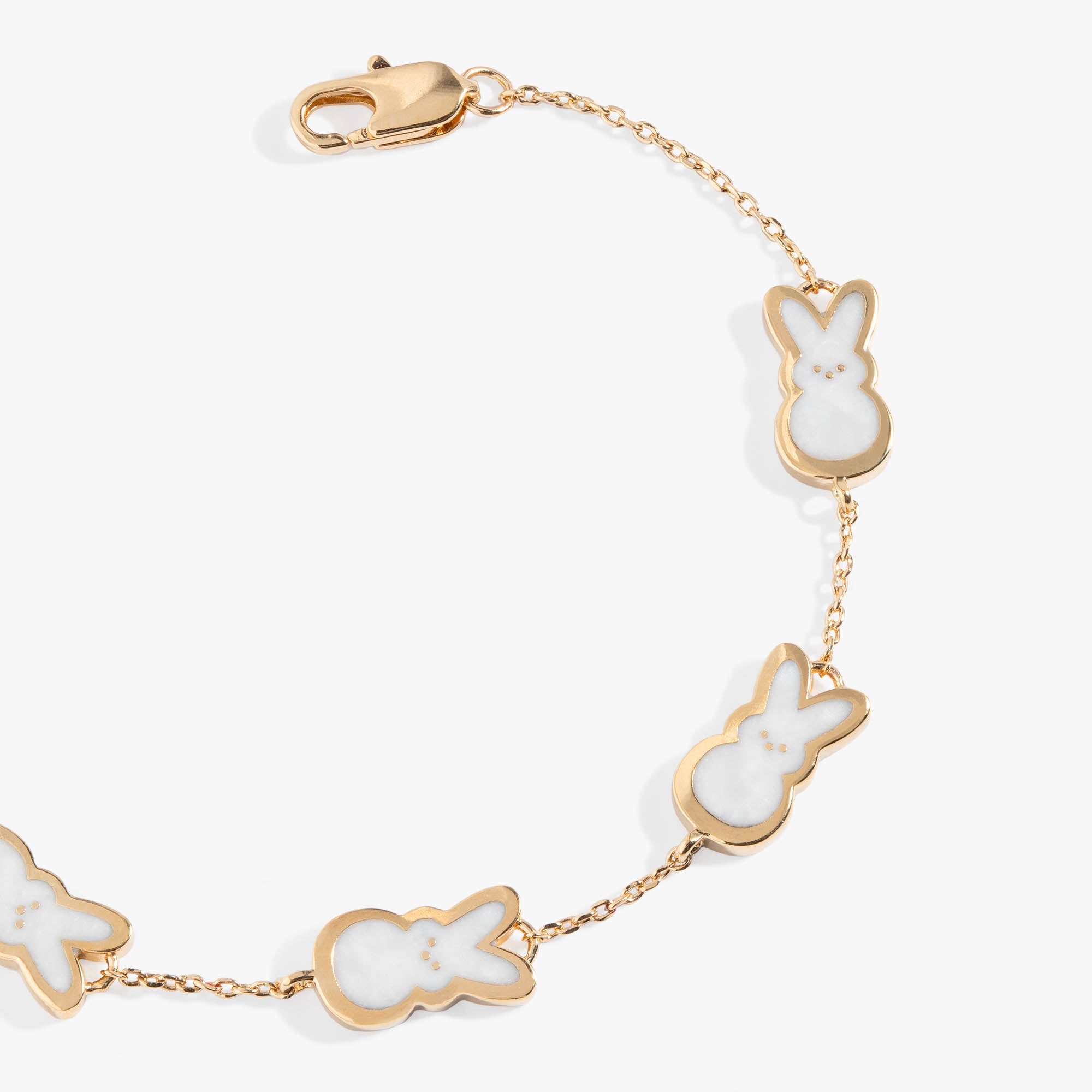 Gold PEEPS® Pearlized Bunny Charm Bracelet by ALEX AND ANI featuring a bunny charm on a stylish bracelet.