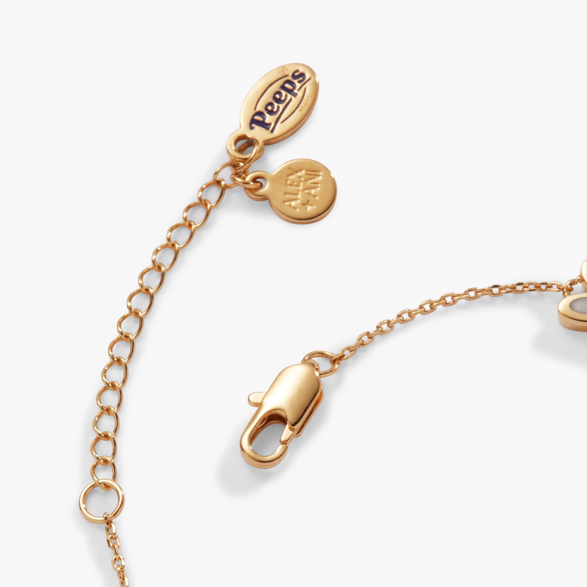 Gold PEEPS® Pearlized Bunny Charm Bracelet by ALEX AND ANI, featuring a bunny charm on a sleek bracelet.