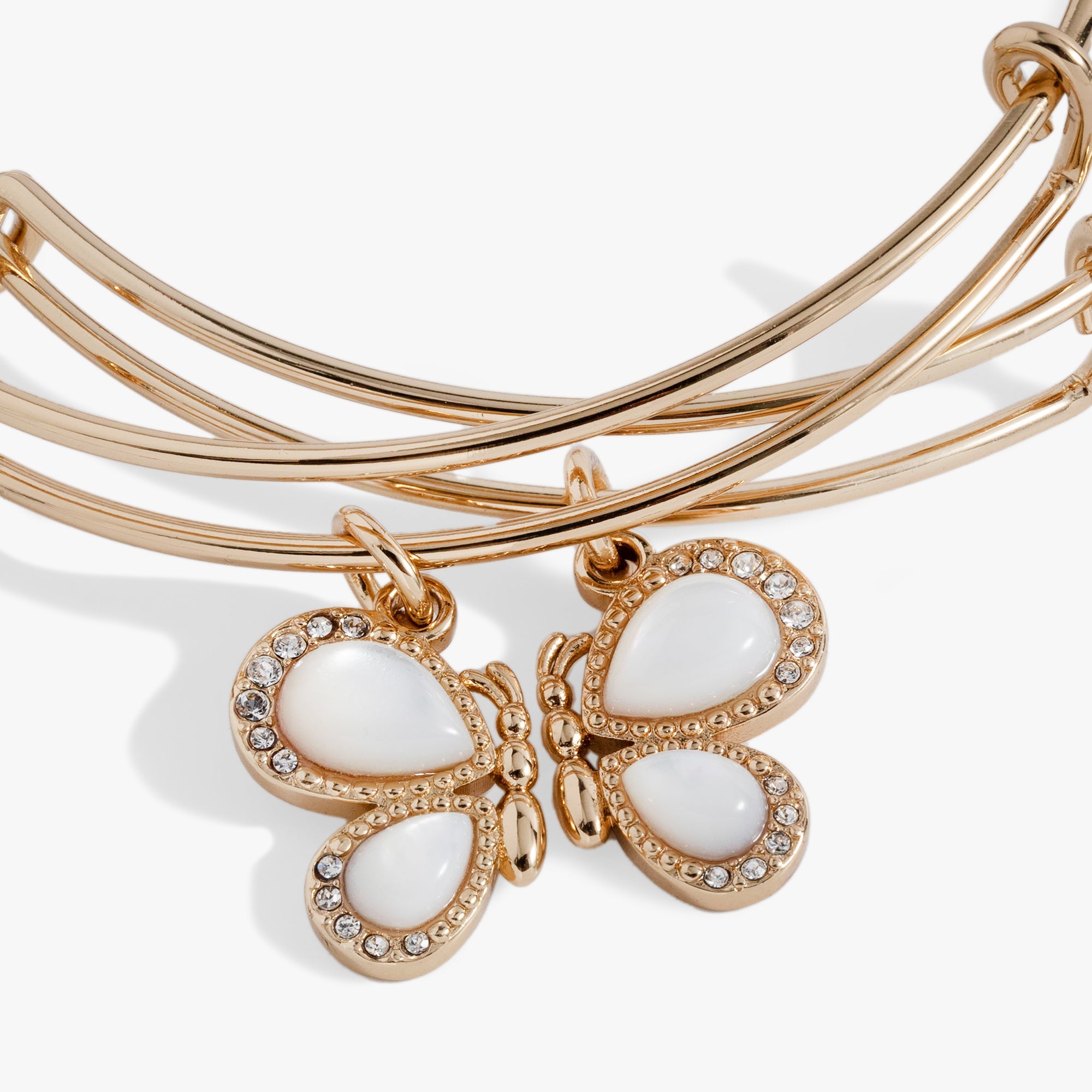 Gold butterfly wings bangle set of 2 by ALEX AND ANI featuring delicate bracelet designs with butterfly motif.