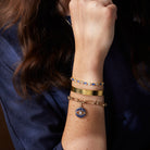 Gold Sodalite Evil Eye Chain Bracelet by ALEX AND ANI, featuring a protective evil eye charm on a delicate chain.