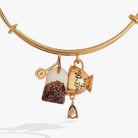 Gold ALEX AND ANI bracelet featuring a "Spill the Tea" cup and tea bag charm, stylish bangle accessory.