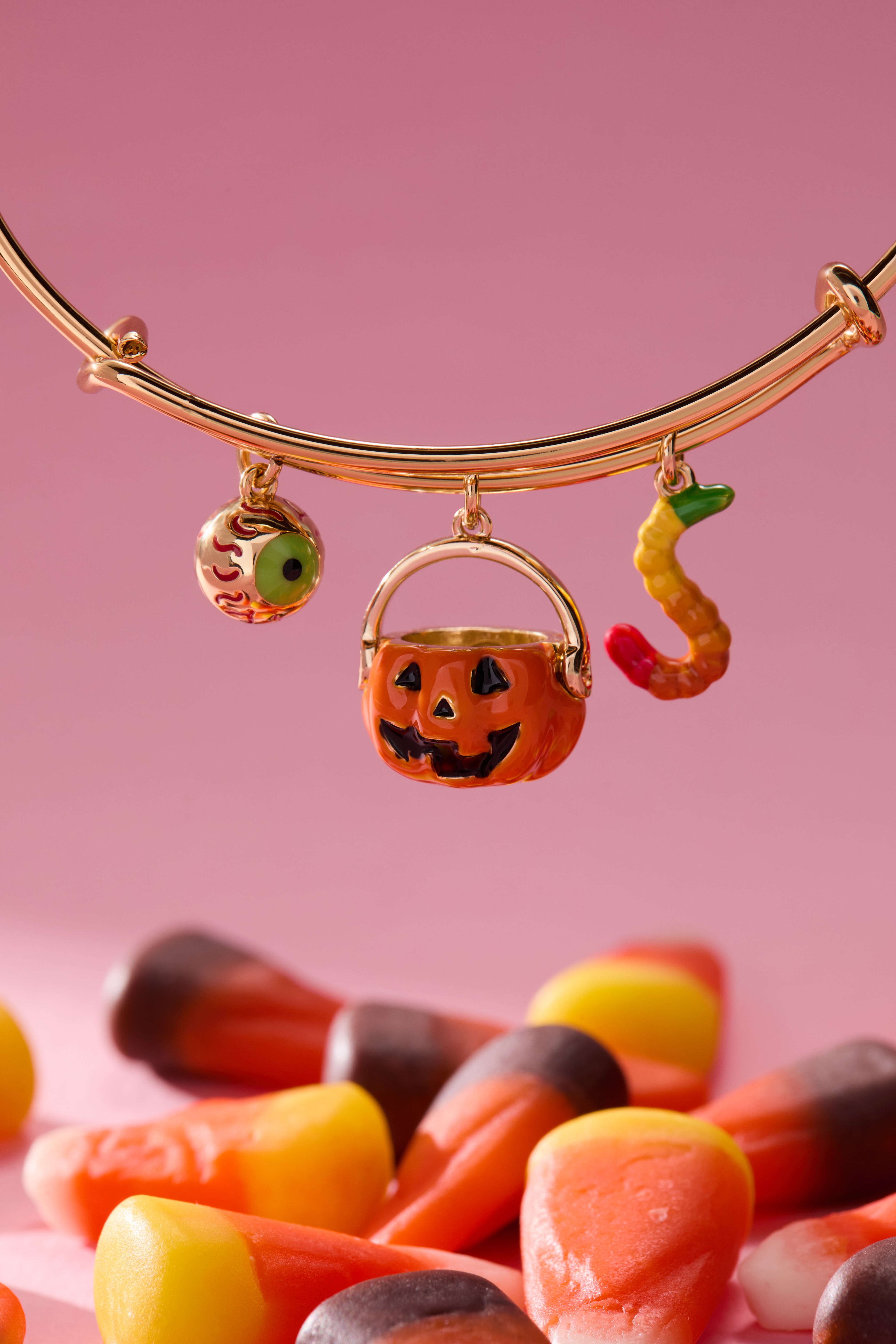 Gold 'Trick or Treat' multi charm bangle bracelet by ALEX AND ANI featuring Halloween-themed charms and intricate design.