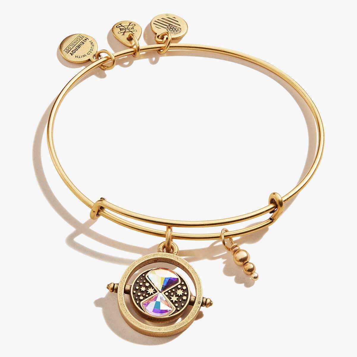 ALEX AND ANI Harry Potter™ Time Turner Spinner Charm Bangle bracelet in silver with a detailed time turner pendant.