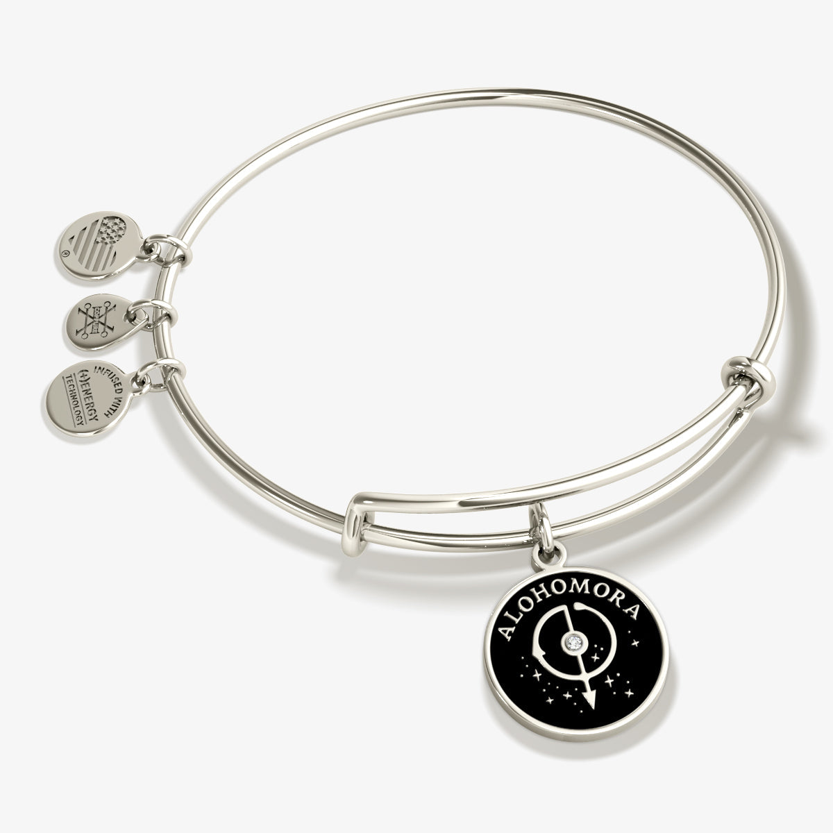 Shiny silver Harry Potter™ Alohomora™ charm bangle bracelet by ALEX AND ANI with detailed magical lock design.