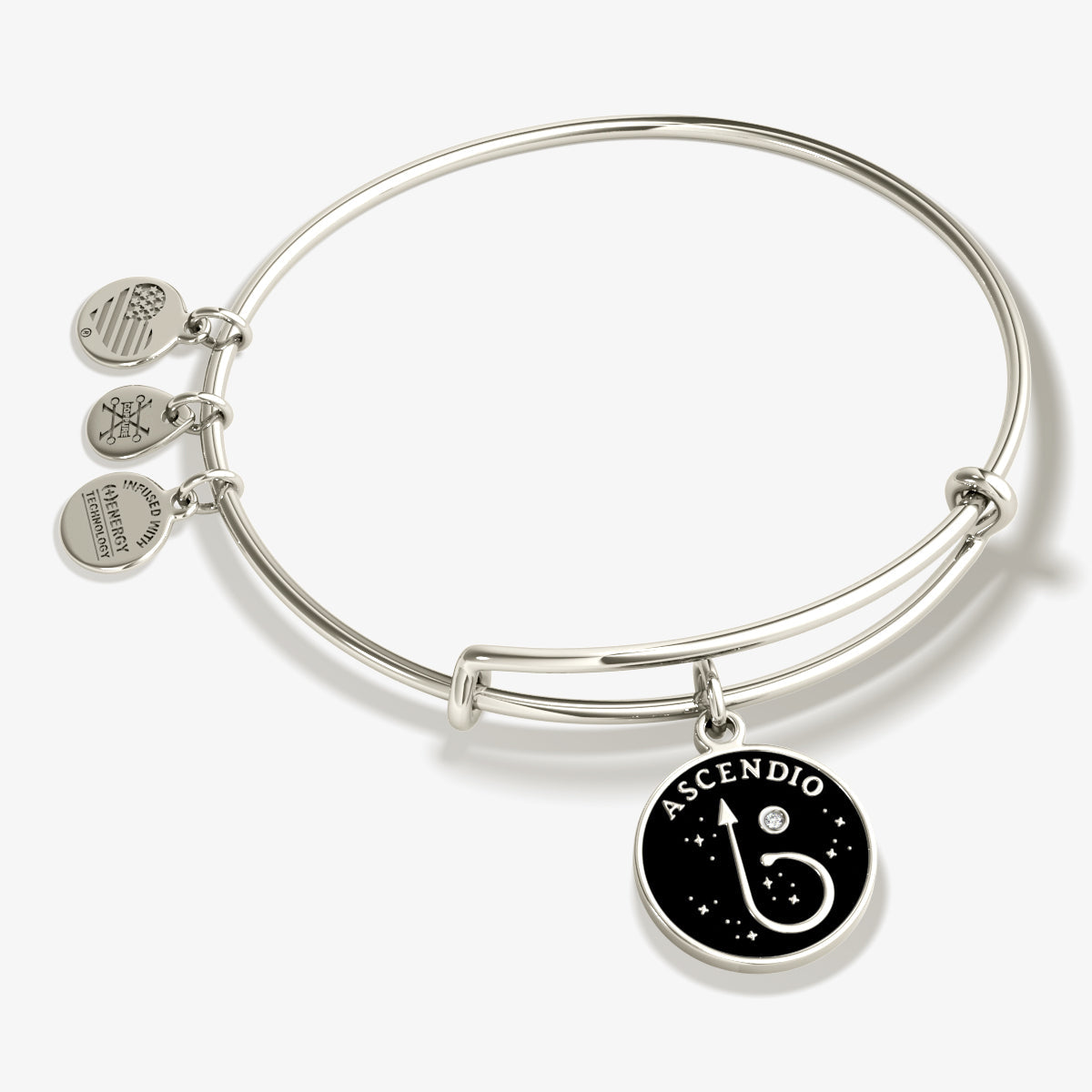 Shiny silver Harry Potter™ Ascendio charm bangle bracelet by ALEX AND ANI with detailed magical design.