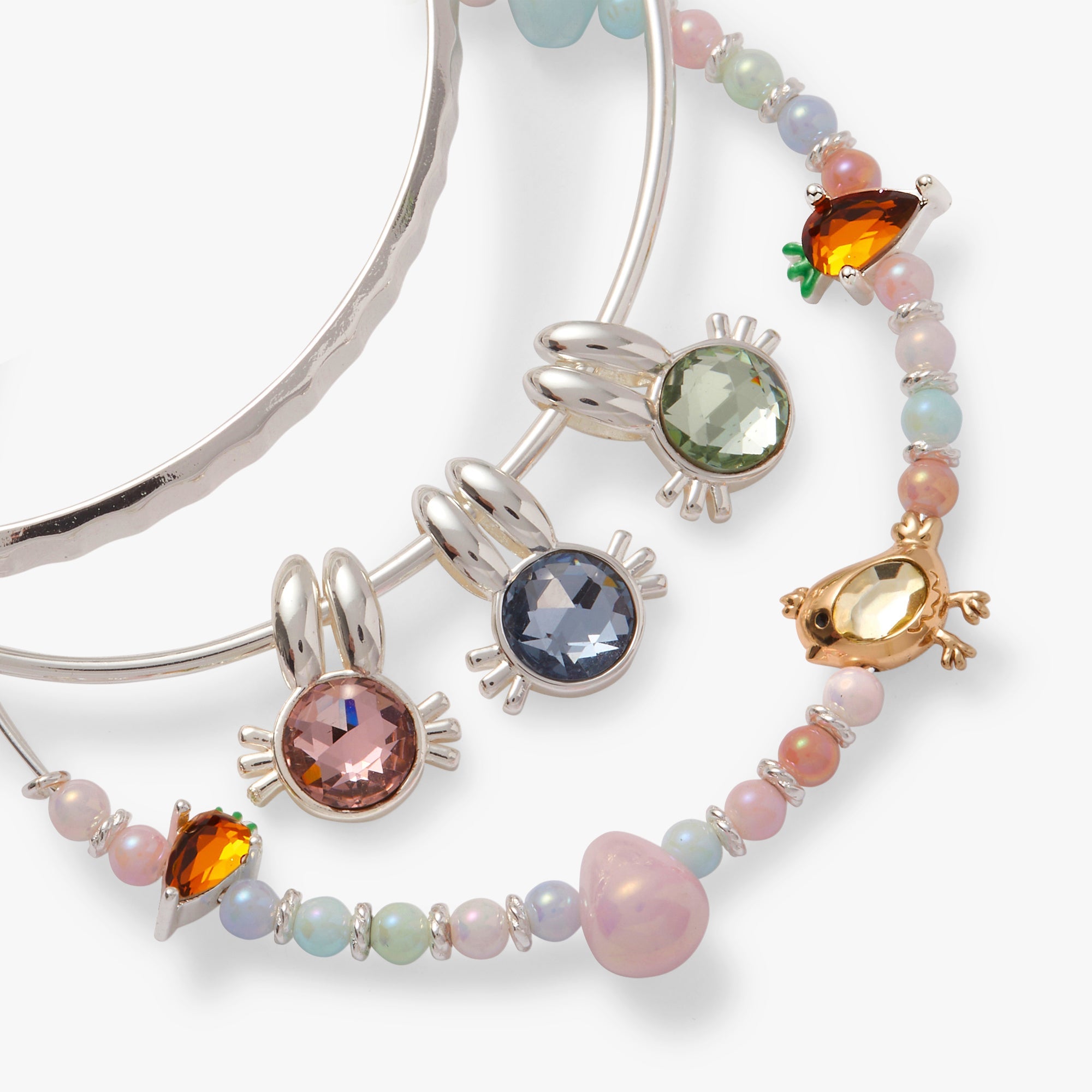 Set of three silver crystal bunny bangles by ALEX AND ANI, featuring sparkling accents and delicate bracelet designs.