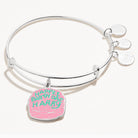 Silver Harry Potter Celebrate Cake charm bracelet by ALEX AND ANI featuring a detailed cake charm on a sleek bangle.