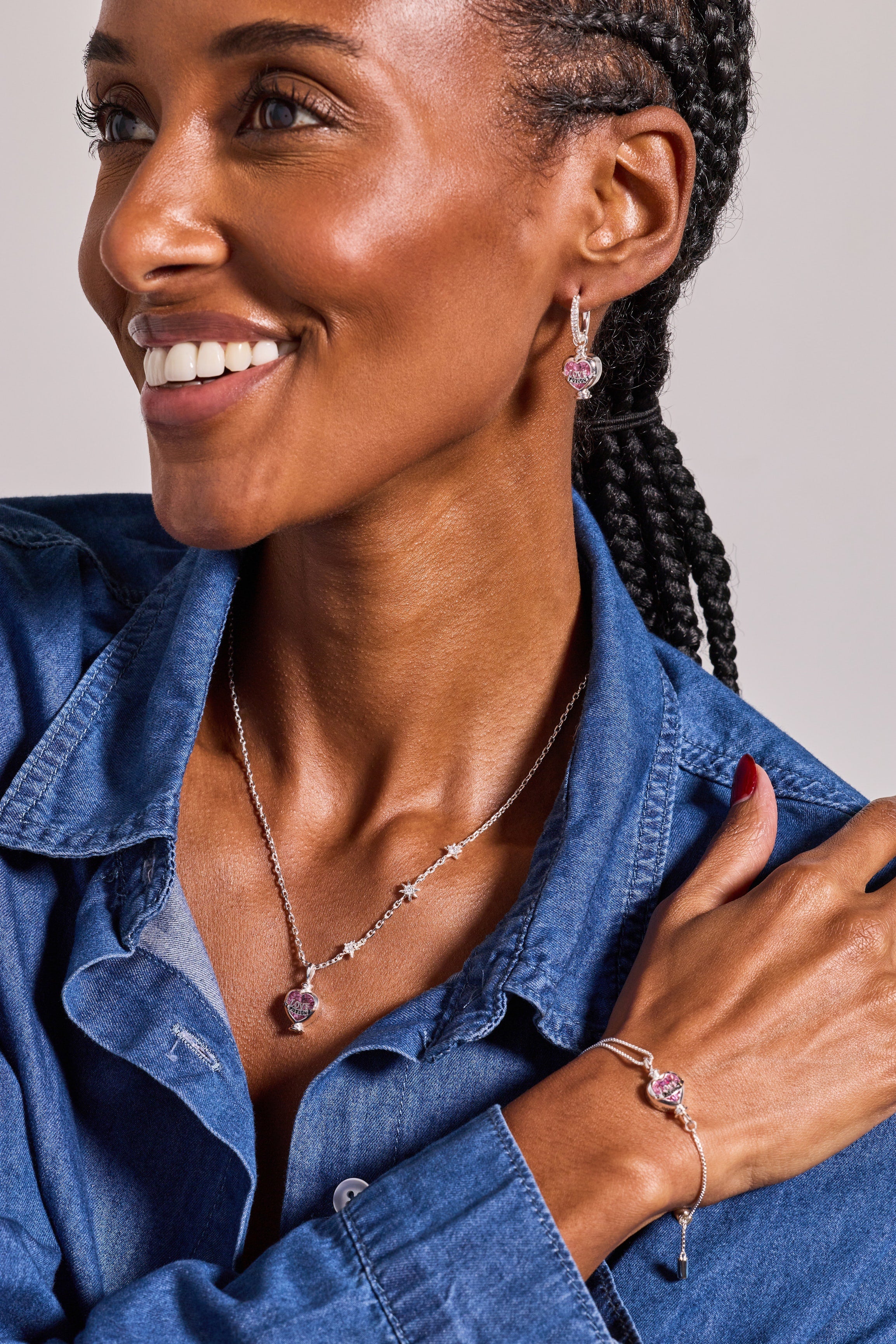 ALEX AND ANI Harry Potter Love Potion crystal pull chain bracelet with silver finish and magical charm details.