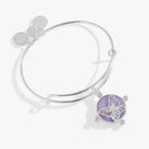 Silver bracelet with lavender butterfly charm from ALEX AND ANI, featuring a delicate butterfly design and elegant bangle style.