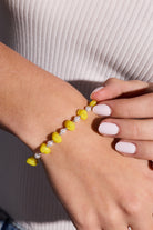 Silver PEEPS® Chick beaded bangle bracelet by ALEX AND ANI, featuring colorful beaded design with chick charm.