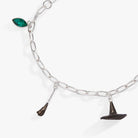 Silver Wizard of Oz Wicked Witch charm bracelet by ALEX AND ANI featuring a witch charm and intricate detailing.